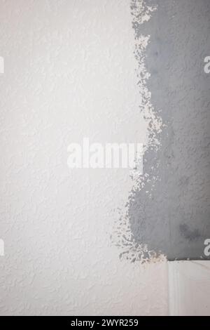 grey painted woodchip wallpaper texture pattern backgroung. Stock Photo