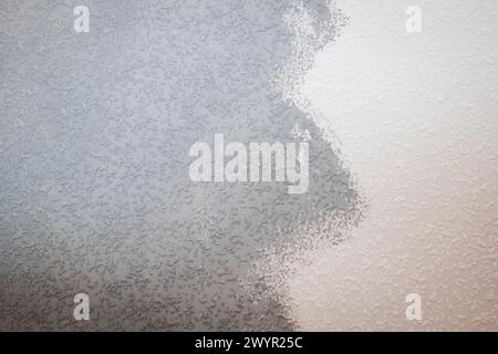 grey painted woodchip wallpaper texture pattern backgroung. Stock Photo