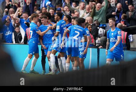 LONDON, ENGLAND - APRIL 7: Harrison Burrows of Peterborough United celebrating his goal to make it 1-0 during the Bristol Street Motors Trophy Final between Peterborough United and Wycombe Wanderers at Wembley Stadium on April 7, 2024 in London, England. (Photo by Dylan Hepworth/MB Media) Stock Photo