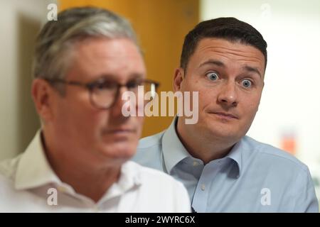 Labour leader Sir Keir Starmer (left) and shadow health secretary Wes Streeting, during a visit to Kings Mill Hospital Sutton-in-Ashfield, in the East Midlands, as they unveil Labour's plans to digitise the 'red book' of children's health records. Picture date: Monday April 8, 2024. Stock Photo