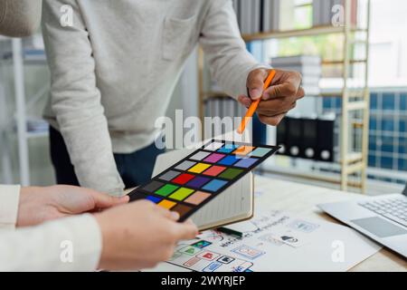 UI designer and UX developer brainstorm idea to design the application interface. Creative digital development agency. UX UI concept Stock Photo
