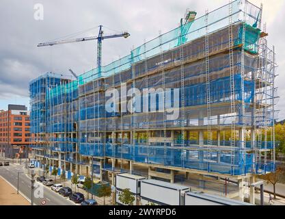 Cranes. Protection in building work in construction. Homebuilding. Donostia, San Sebastian, Basque Country, Spain. Stock Photo