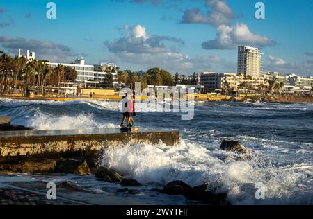 Paphos, Cyprus - December 23, 2023: Big sea waves crashing on Paphos promenade after winter storm. Stock Photo