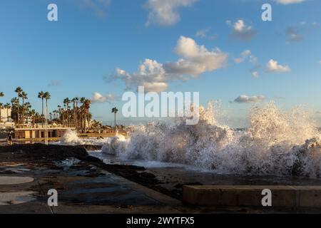 Paphos, Cyprus - December 23, 2023: Big sea waves crashing on Paphos promenade after winter storm. Stock Photo