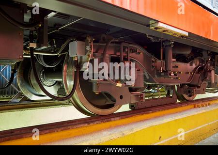 Railroad wheels. Assembly workshop trams. Manufacture of trains. Stock Photo