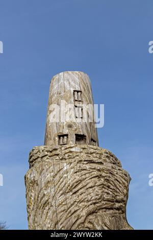 Wooden artwork, lighthouse, LLanddwyn Bay, Newborough, Anglesey Island, Wales, Great Britain Stock Photo