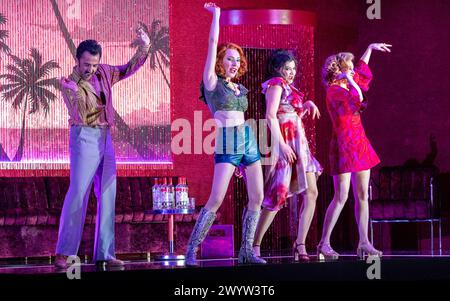 l-r: Pierre Doyen (Dancairo), Gabriele Kupsyte (Mercedes), Aigul Akhmetshina (Carmen), Piotr Beczala (Don Jose), Sarah Dufresne (Frasquita) in CARMEN at the Royal Opera House, Covent Garden, London WC2  05/04/2024 music: Georges Bizet  libretto: Henri Meilhac & Ludovic Halevy  dramaturg: Elisa Zaninotto  conductor: Antonello Manacorda  set design: Paulo Fantin  costumes: Carla Teti  lighting: Alessandro Carletti  director: Damiano Michieletto Stock Photo