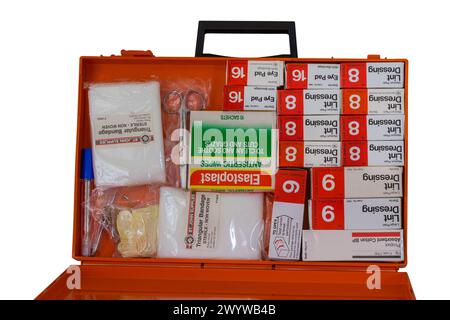 Contents of First Aid Kit box including lint dressing eye pad antiseptic wipes set on white background Stock Photo