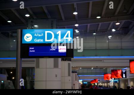 DUBAI, UNITED ARAB EMIRATES - JUN 21, 2019: Sign at departure gate D14 at Dubai airport Stock Photo