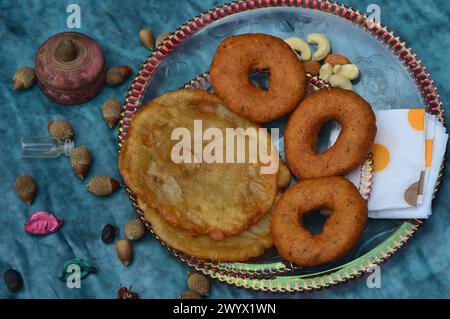 Image of babru bhalla,malpua traditional snack dishes of mandi himachal pradesh india, mark of festivals. Stock Photo