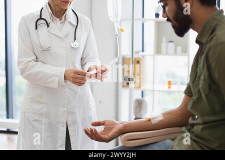 Efficient general practitioner checking solution for chemotherapy of male. Stock Photo
