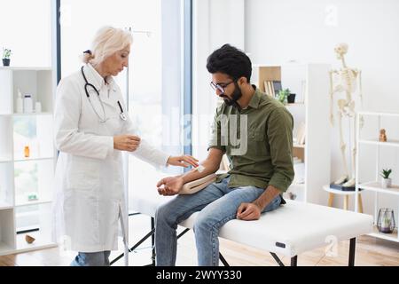 Efficient general practitioner checking solution for chemotherapy of male. Stock Photo