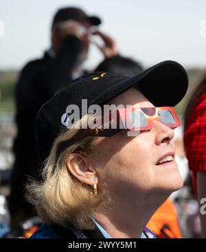 Indianapolis, United States Of America. 08th Apr, 2024. Indianapolis, United States of America. 08 April, 2024. NASA Deputy Administrator Pam Melroy watches a total solar eclipse through protective glasses from the Indianapolis Motor Speedway, April 8, 2024, in Indianapolis, Indiana. A total solar eclipse swept across a narrow portion of the North American continent from Mexico to the Atlantic coast of Newfoundland, Canada. Credit: Joel Kowsky/NASA/Alamy Live News Stock Photo