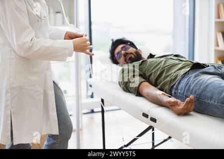 Cropped view efficient general practitioner checking solution for chemotherapy Stock Photo