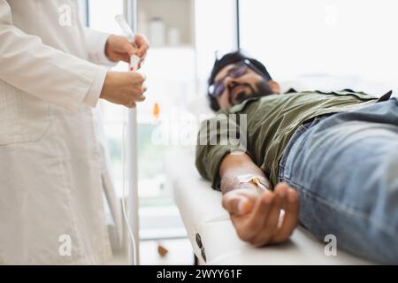 Cropped view efficient general practitioner checking solution for chemotherapy Stock Photo