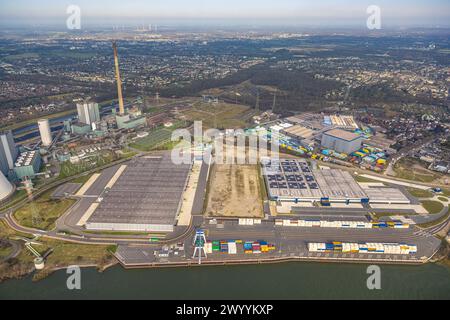 Aerial view, logport VI construction site with new building, logistics company DSV Halle and STEAG Walsum cogeneration plant in Alt-Walsum on the Rhin Stock Photo
