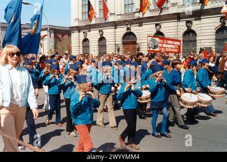 Demonstration on May 1st 1973 on the street 'Unter den Linden' in East Berlin with a music group of the communist pioneer organization . Stock Photo