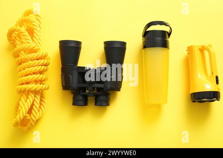 Set of travel items on yellow background Stock Photo