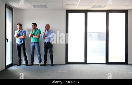 Executives. Empty office building. Stock Photo