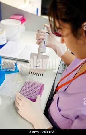 Lab technician preparing the sample for a PCR test Stock Photo - Alamy