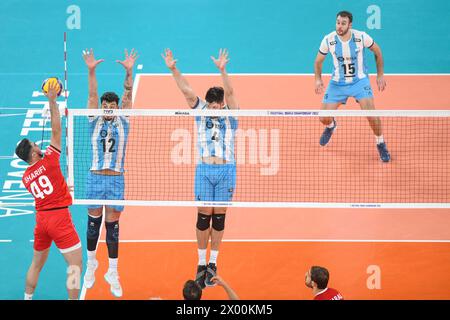 Bruno Lima, Joaquin Gallego (Argentina), Morteza Sharifi (Iran). Volleyball World Championship 2022. Stock Photo
