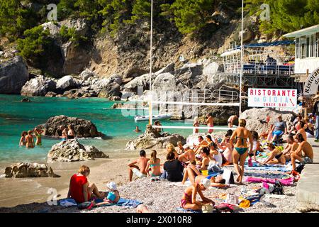 Sunbathers and swimmers at the Marina Piccola, Capri, Campania, Italy, Europe Stock Photo