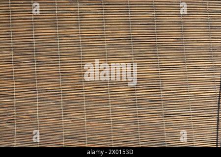 Bamboo wood curtain or blind for window seamless background and texture, asian traditional home decoration Stock Photo
