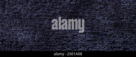 Navy blue background from a soft textile material. sheathing fabric with natural texture. Cloth backdrop. Stock Photo