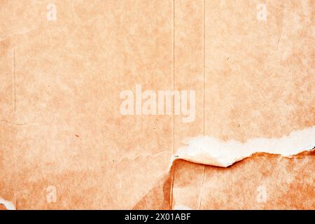 Texture of torn ripped cardboard paper as background Stock Photo