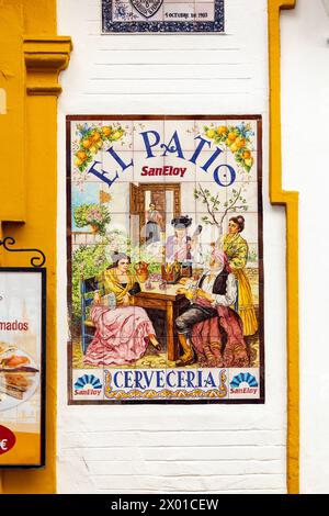 Tiled sign on the facade of El Patio San Eloy tarvern, Seville, Spain Stock Photo