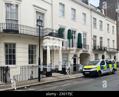 The scene on Stanhope Place, Bayswater, where a murder investigation is under way after a woman was found dead with a number of stab wounds in her home in Westminster, the Metropolitan Police has said. Picture date: Tuesday April 9, 2024. Stock Photo