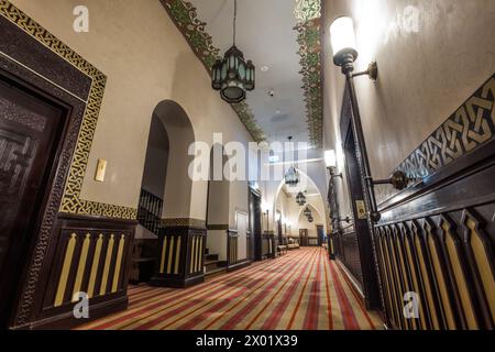 ASWAN, EGYPT - SEPTEMBER 03, 2017: Interior hallway of the Arabian-inspired Old Cataract Hotel. Stock Photo