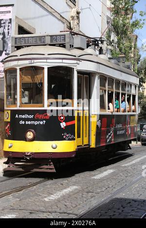 The Lisbon tramway network (Rede de elétricos de Lisboa) is a system of trams that serves Lisbon, the capital city of Portugal. In operation since 1873, it presently comprises six lines. The system has a length of 31 km, and 63 trams in operation (45 historic 'Remodelados', 8 historic 'Ligeiros' and 10 modern articulated trams). The depot is located in Santo Amaro, in Alcântara. Stock Photo