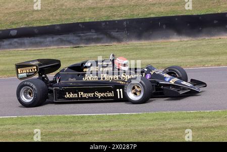 Marco Werner driving Nigel Mansell's 1983 Lotus 92 during the 75 Years of Lotus Celebration parade. 2023 Goodwood Revival, Sussex, UK Stock Photo
