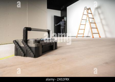 Commercial Building Interior Remodeling Theme with a Toolbox and a Ladder Stock Photo