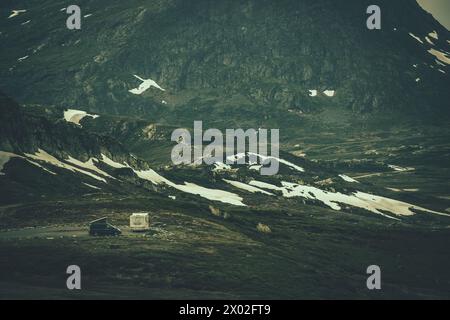 Boondocking Camper Van Camping Somewhere in Norwegian Wilderness. Road Trip Theme. Stock Photo