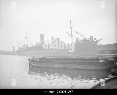 HMS HILARY, BRITISH OCEAN BOARDING VESSEL. 31 MARCH 1942, SURREY DOCKS ...