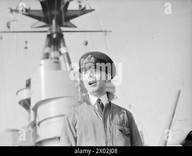 In September 1940, officers and crew aboard the battleship HMS Rodney included Wt Ordnance Officer R A E Marwood from Plymouth. Stock Photo