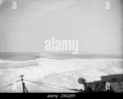 PREPARATIONS FOR NORWEGIAN OPERATIONS. OCTOBER 1941, ON BOARD THE DESTROYER HMS BEDOUIN. HMS VICTORIOUS AND HMS KING GEORGE V ALONG WITH ESCORTING DESTROYERS DURING SEVERAL DAYS OF PREPARATION FOR NORWEGIAN OPERATIONS. - HMS VICTORIOUS steaming at sea Stock Photo