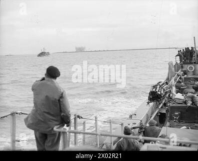 BRITISH COMMANDOS LAND ON WALCHEREN AT WESTKAPELLE. 1 NOVEMBER 1944, ON ...