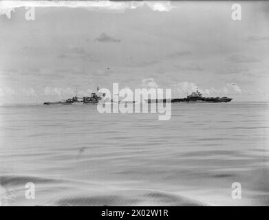 SHIPS OF THE EASTERN FLEET. AUGUST 1942, ON BOARD HMS MAURITIUS. - HMS WARSPITE, battleship, and HMS ILLUSTRIOUS, aircraft carrier Stock Photo