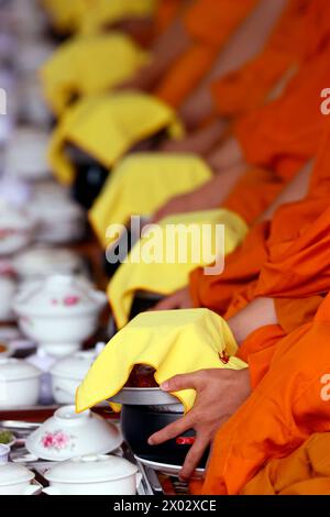 Vegetarian meal, monks at Buddhist ceremony in the main hall, Phuoc Hue Buddhist pagoda, Tan Chau, Vietnam, Indochina, Southeast Asia, Asia Stock Photo