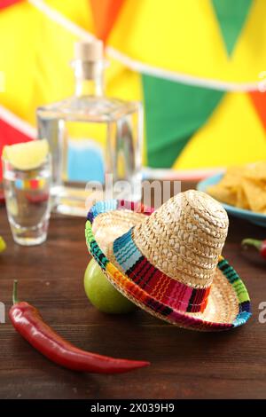 Mexican Sombrero Hat, Lime And Chili Pepper On Wooden Table Stock Photo 