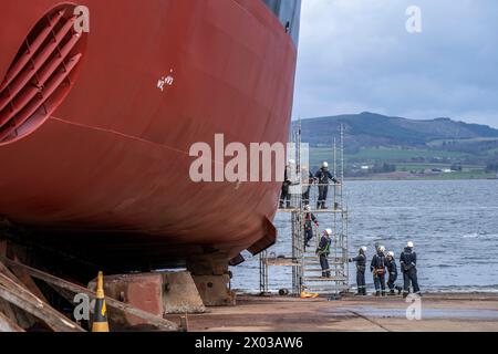 Workers make final preparations before the launch of the MV Glen Rosa at Ferguson Marine Port Glasgow shipyard, marking the first time the vessel will enter the water. Picture date: Tuesday April 9, 2024. Stock Photo