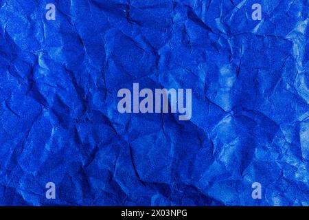 Blue Paper Texture background. Crumpled Blue paper abstract shape background. Stock Photo