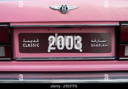 Silver and pink coloured Bentlley Mulsanne (1980s) parked in Dubai,United Arab Emirates Stock Photo