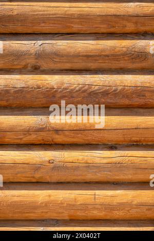 Wooden wall of the log house. Abstract background and texture for design Stock Photo