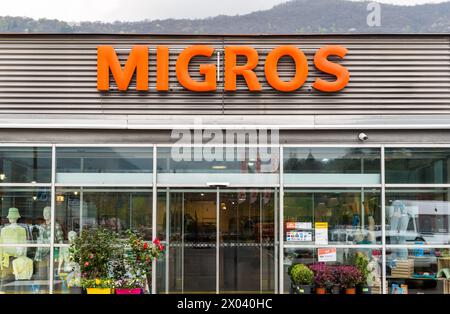 Agno, Ticino, Switzerland - April 9, 2024: View of the Migros supermarket in Agno, it is the largest supermarket chain in Switzerlan Stock Photo