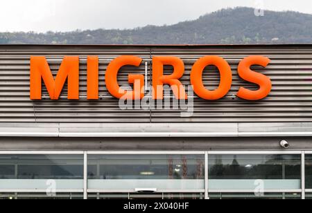 Agno, Ticino, Switzerland - April 9, 2024: View of the Migros supermarket in Agno, it is the largest supermarket chain in Switzerlan Stock Photo