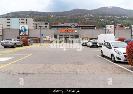 Agno, Ticino, Switzerland - April 9, 2024: View of the Migros supermarket in Agno, it is the largest supermarket chain in Switzerlan Stock Photo